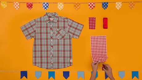 Retalhos xadrez são recortados ao lado de camisa xadrez em atividade de customizar trajes típicos de festa junina para meninos